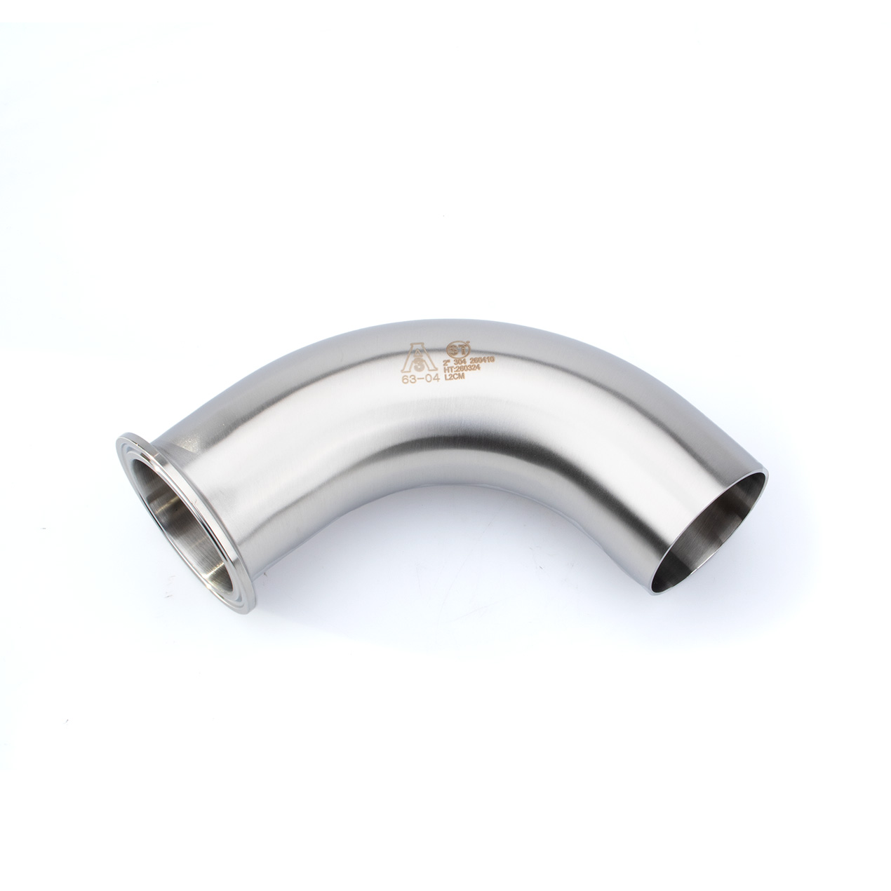 Clamp x butt weld 90 degree elbow installed in sanitary food processing piping system